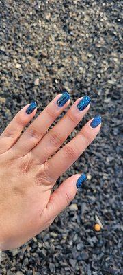 Black with blue glitter...gel nails