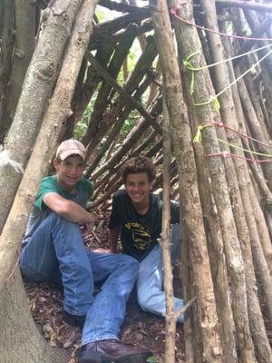 Summer camp fun! Building shelters in Outdoor Education.