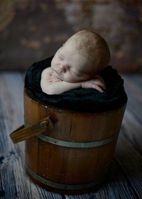 Baby in a bucket