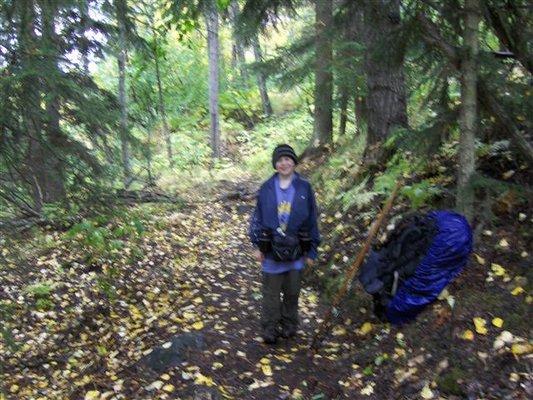 Son hiking a trail