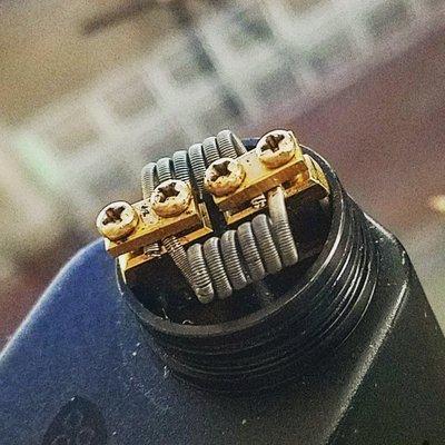 Fused Clapton with 24ga kanthal and 32ga Nichrome. All thanks to Allusive Cloud Factory