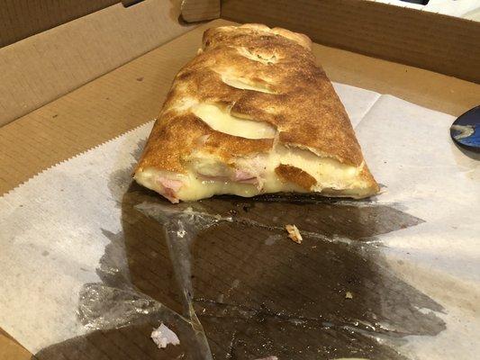 Center of what should be a Large Italian Stromboli that had nothing but cheese and maybe a random piece of ham