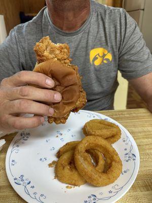 Breaded Tenderloin Sandwich plus onion rings. Yum. Gotta ask for all toppings.