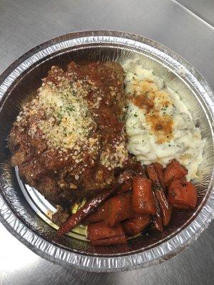 To Go-Italian Meatloaf dinner with homemade mashed potatoes and glazed carrots.