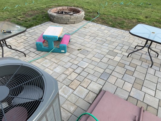 The original patio ends where the basement hatch way is the extension is all to the left near the fire pit