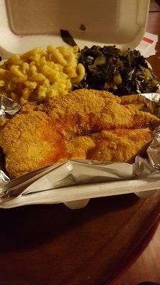 Catfish platter with collard greens and Mac and cheese.  A lot of food for 9 dollars!