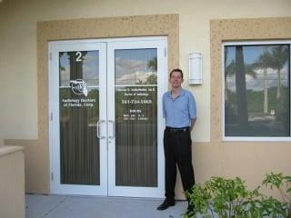 Audiology Doctors of Florida's entrance with Dr. Sederholm.