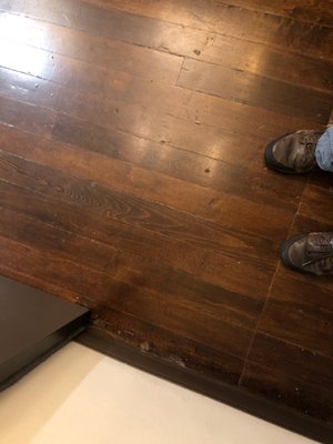 Floor near the bathroom.