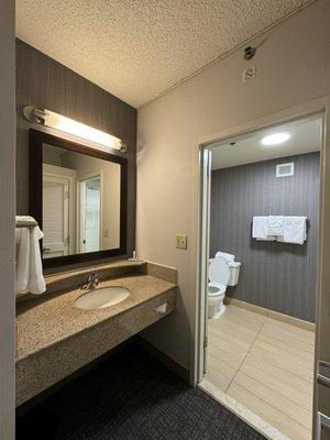 Separate sink and shower/toilet