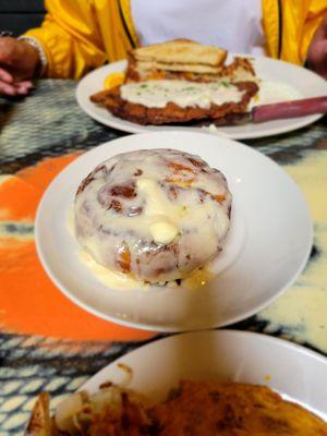 Cinnamon Roll, chicken fried steak and chorizo omlete. Very yummy.left with a hapoy and full tummy