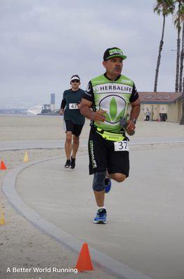 Running a 5k in Long Beach,  we train people to run.