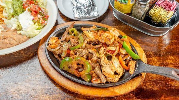 Fiesta (Grilled Chicken, Steak, Shrimp) Fajitas