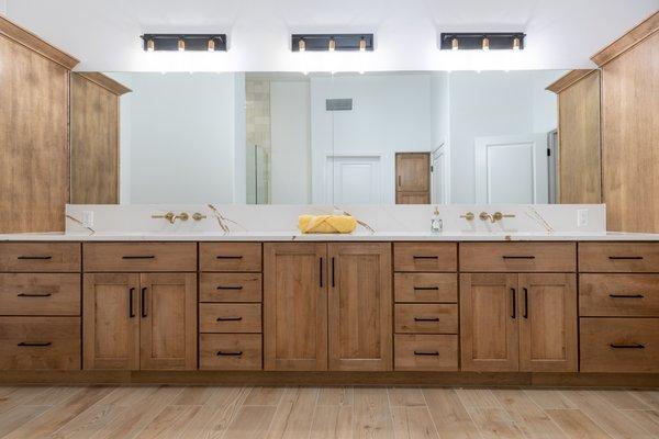 Loving these rich brown frameless cabinets.