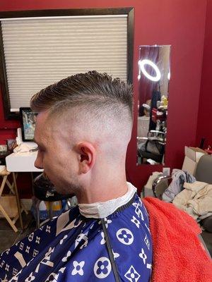 T.G.C. Barbershop High skin bald fade