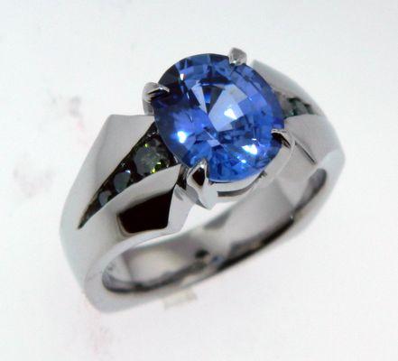 Blue Montana Sapphire and Green diamond ring in 18k White Gold