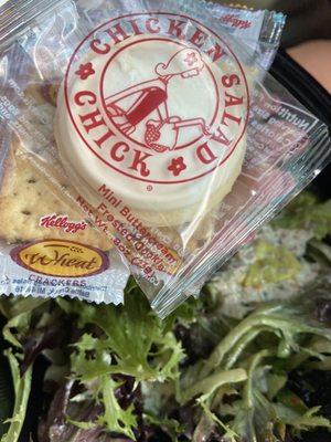 Crackers and a complimentary buttercream frosted cookie.