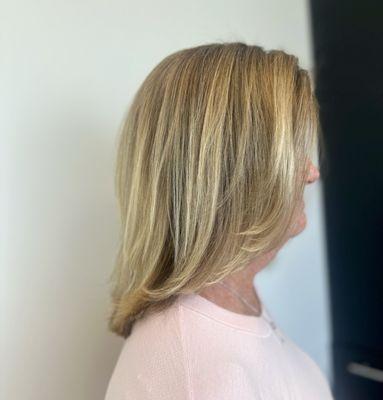 Root color highlights haircut and Brazilian blowout