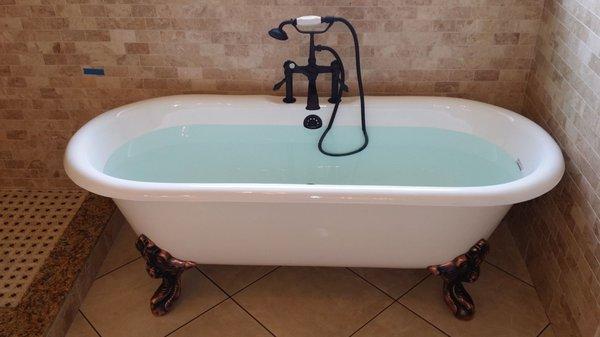 claw foot tub installation. by warrens plumbing.