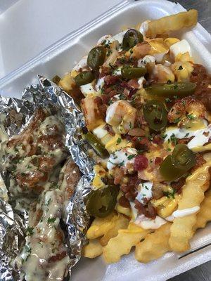 Garlic Parmesan wings with loaded fries