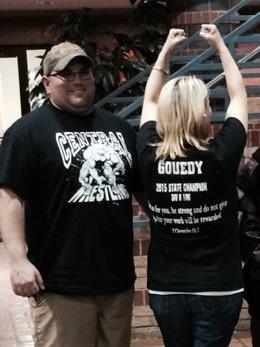 Happy parents of a son who won 2015 state championship in wrestling! And they have the T-shirt to prove it!...