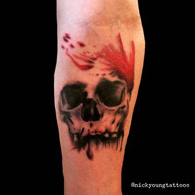 Custom skull tattoo by Nick.