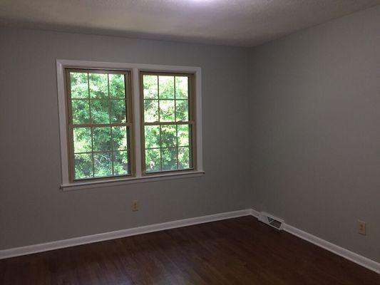 Bedroom after priming and painting over nicotine damage