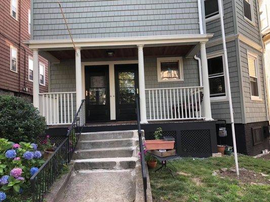 Painting trim, new front doors, new trex porch floor!