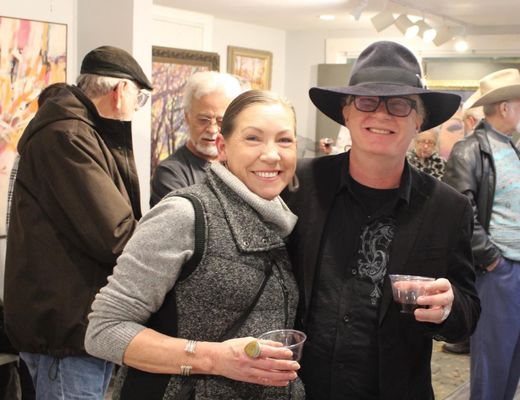 James Smith with art patron at Solo Show for local artist Stan Perkins at Denison Art Gallery