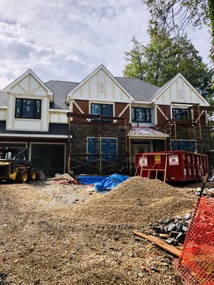 Poured concrete slabs installed in basement, porch and garage.  2018