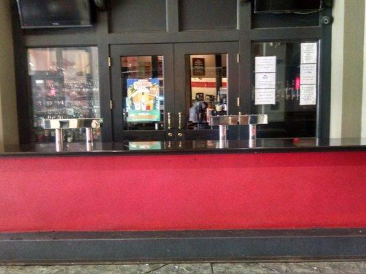 An inviting bar in Alley Station.  You can step right up to this outside counter and place your order.  How cool!