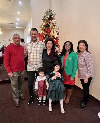 A family in Gateway with the pastors