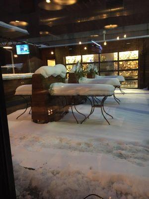 Snowy covered patio area and detached private dining room