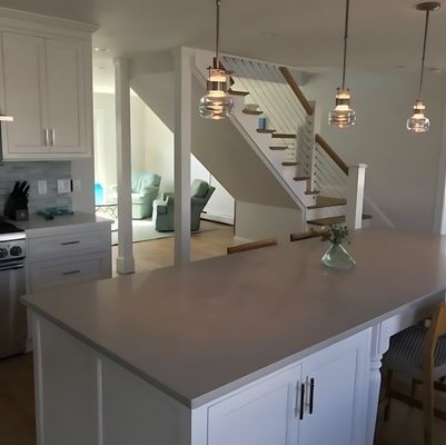 Beach House Renovation, Duxbury, MA - Kitchen/Stairs with Stainless Steel Under Railings