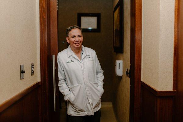 Jordan Benis, the lead hearing practioner in the Lone Tree hearing clinic.