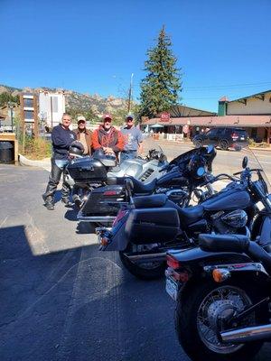 EagleRider harleys on the  ational park road crossing the Rockies Great Divide