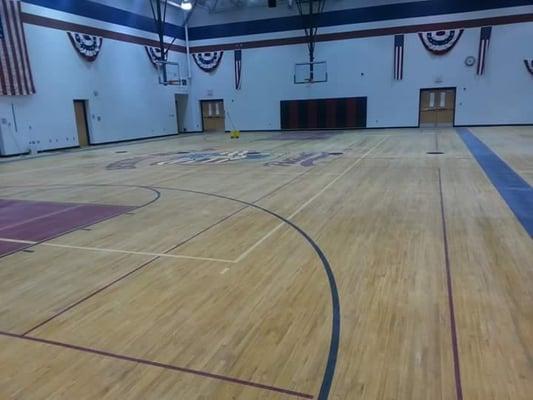 Dull gym floor no shine.