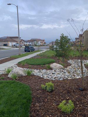 Front with rock stream bed