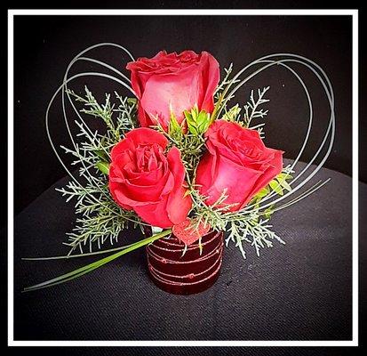 Valentine's Day red rose arrangement.