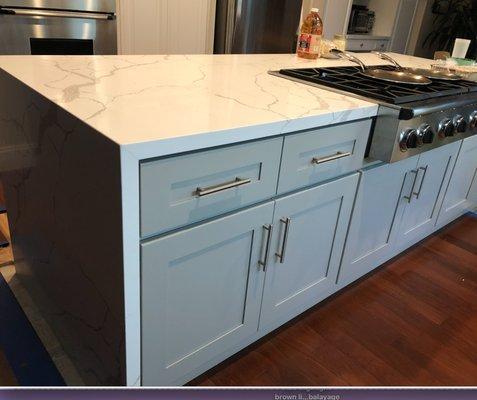 Our gorgeous countertop and waterfall fabricated and installed by American Marble.  Superb craftsmanship!