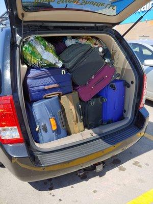 Seats out, nothing but luggage filling the entire van to Kansas City Airport.