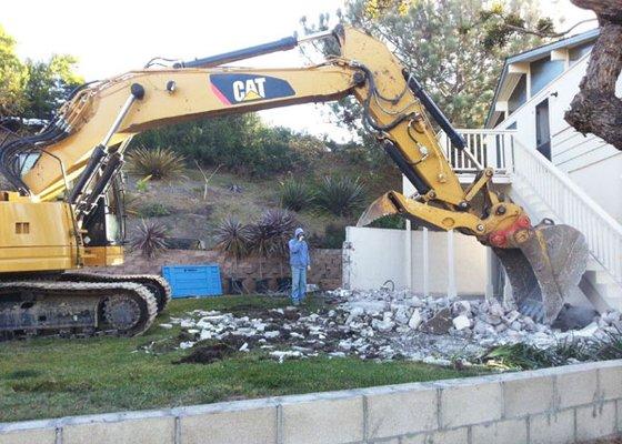 This concrete patio demolition in Del Mar, CA was the first phase in a major structural demolition.