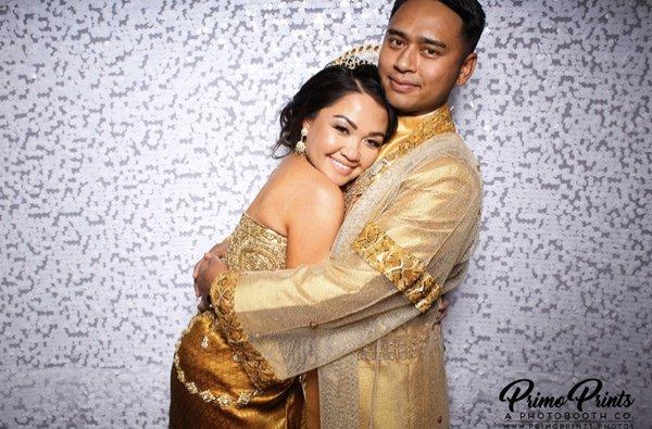 Bride and Groom in their traditional Cambodian Bridal outfit by Khmer Bridal Boutique. A little Photobooth action by Primo Prints.