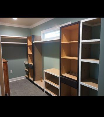 Custom designed closet. This was an empty room before it had the shelves