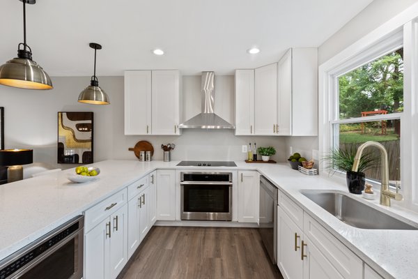 Removed a wall to create this open concept kitchen for our clients.