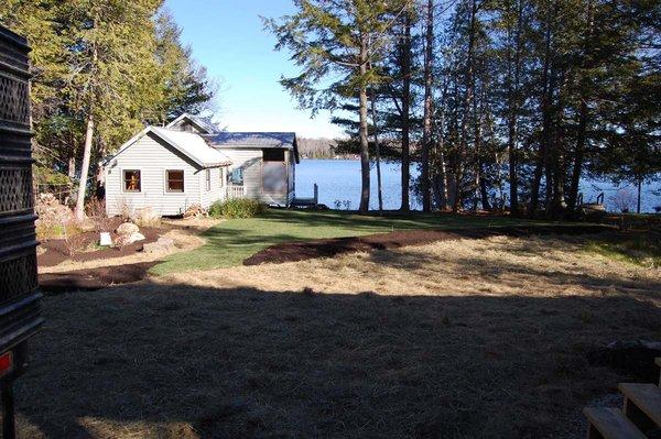 enhanced lakeshore protection with runoff direction and water absorbing garden plantings