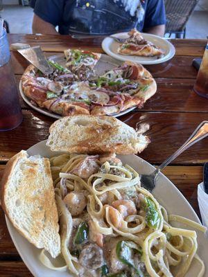 Shrimp primavera & deluxe pizza. Yum!