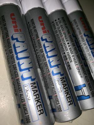 Full array of paint markers including Uni PX30s