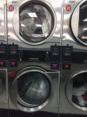 Dryers. Most time in dryers is free with wash. 8min/$0.30 after free time is over.