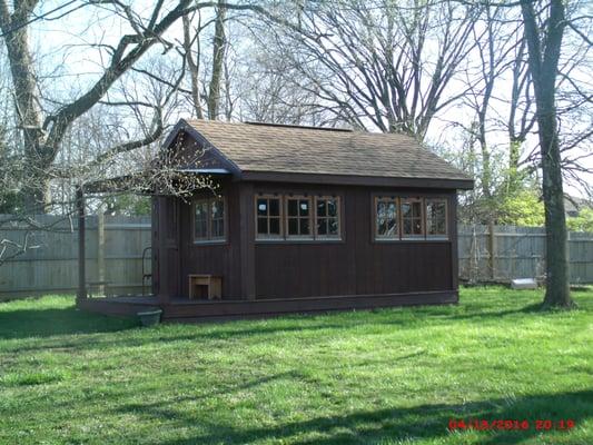 This is a small outdoor structure that Everybody's Favorite Deck Guy built for gardening with a ramp in the back for lawnmowers,