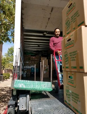 Mover loading my items in the truck.